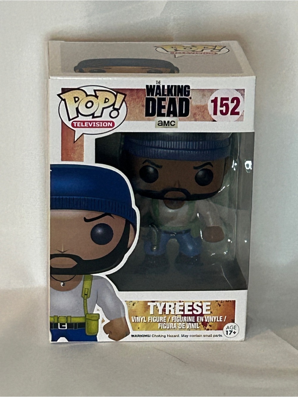 Funko Pop! The Walking Dead Tyreese โ Blue Beanie, Green Vest, White Shirt